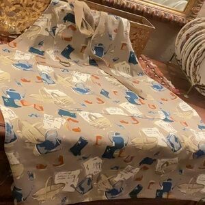 Awesome potting or work aprons. Never worn.  Nice canvas fabric w/ brass d-rings